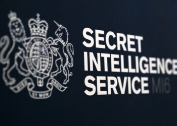 UK spy chief warns China, Russia racing to master AI
