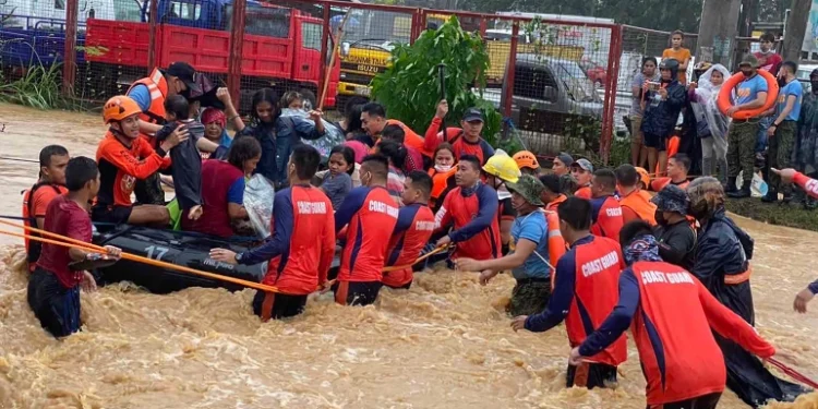 Four dead, provinces cut off as Typhoon Rai batters Philippines