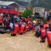 Four dead, provinces cut off as Typhoon Rai batters Philippines
