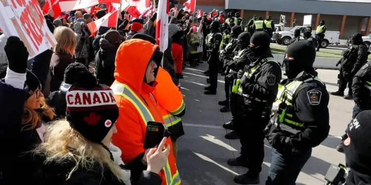 Police clear last remaining protesters from key bridge between the U.S. and Canada